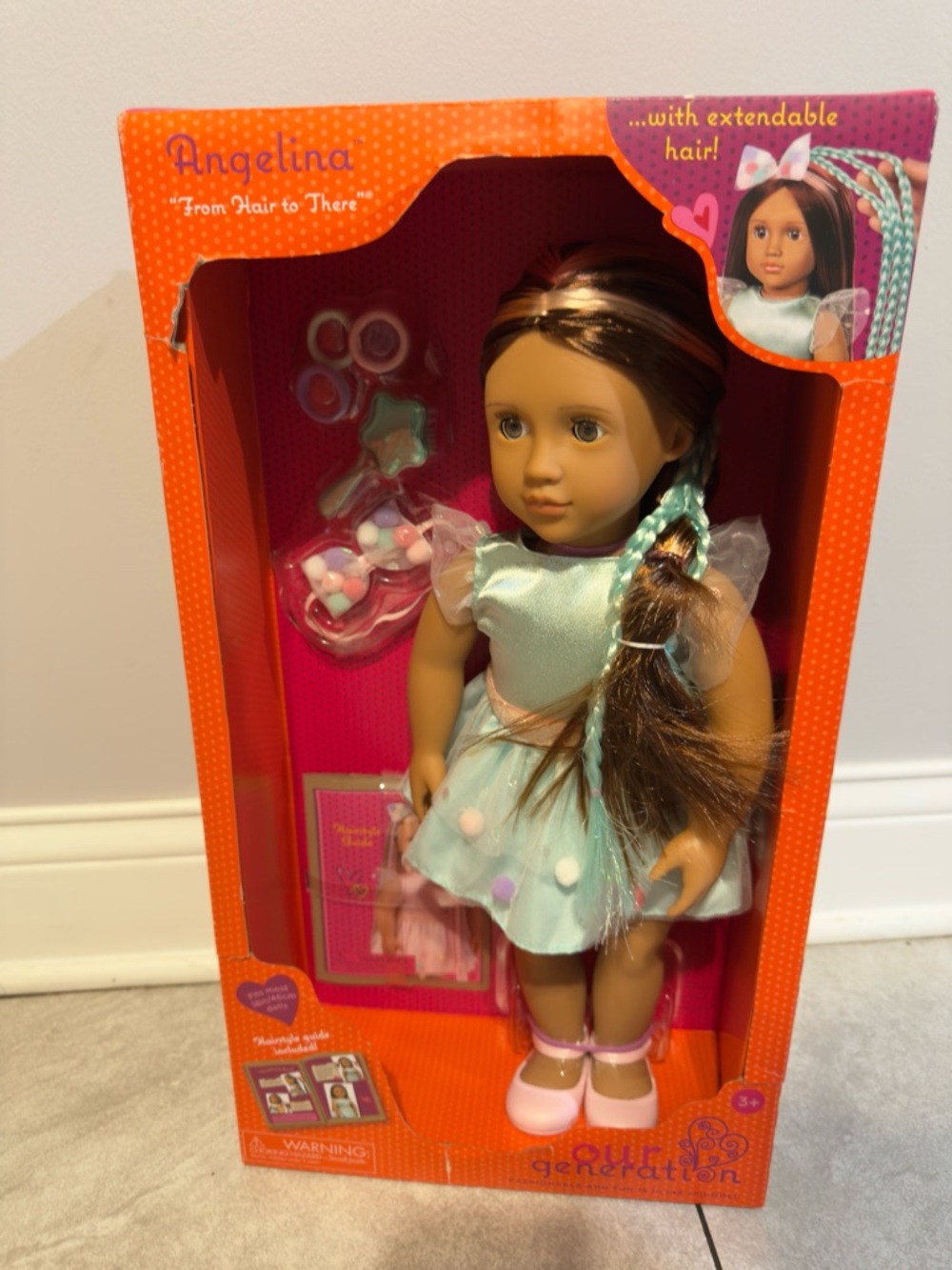 Angelina Brown-Haired Doll in Mint Dress